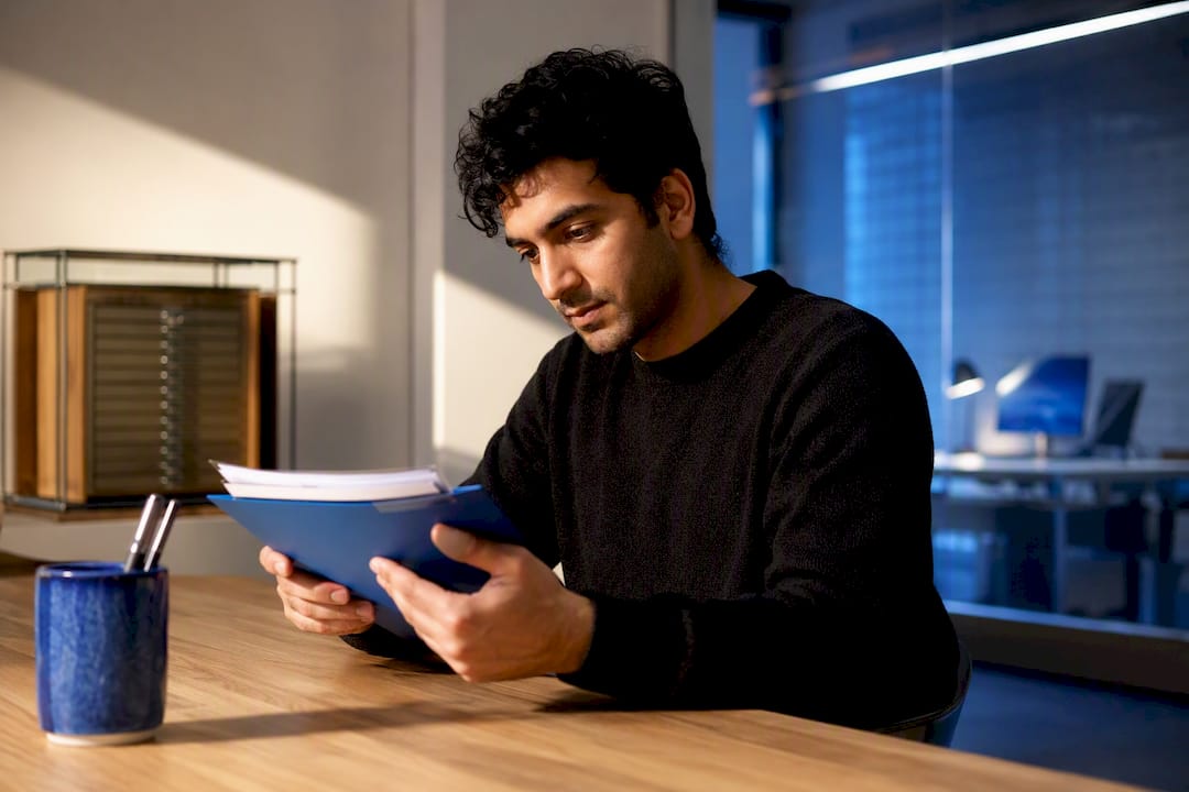 Reviewer examining a dataset datasheet
